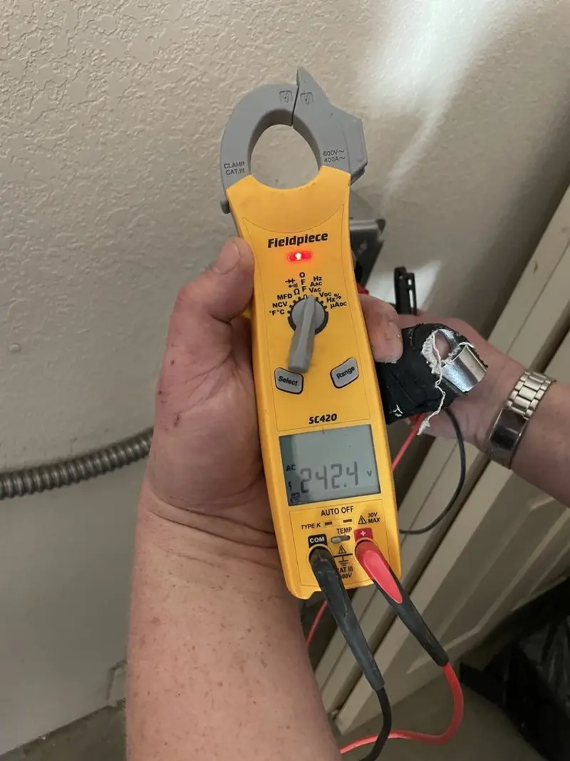 Voltage testing with clamp meter during Electrical Installation Services in Piedmont